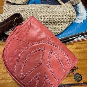 The Sak Coral Pink Leather Crossbody Bag with Decorative Stitching